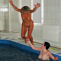 MILF slut flashes strangers in public