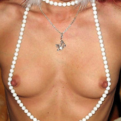 MILF slut gets naked in public