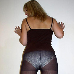 MILF slut flashes strangers in public