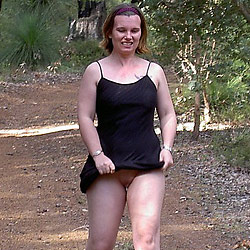 MILF slut flashes strangers in public