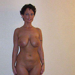 Swinger mom fucked in an orgy