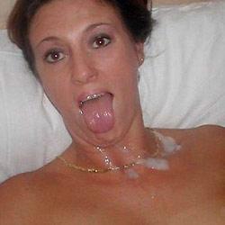 MILF slut gets naked in public