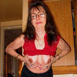 Swinger mom fucked in an orgy
