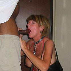 MILF slut gets naked in public