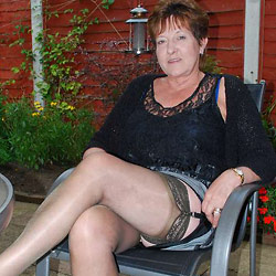 Swinger mom fucked in an orgy