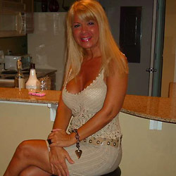 Swinger mom fucked in an orgy