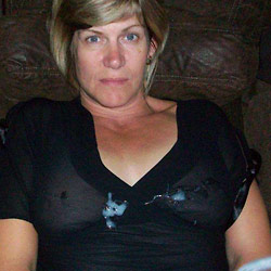 MILF slut gets naked in public