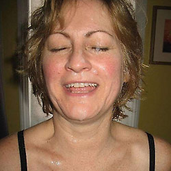MILF slut gets naked in public