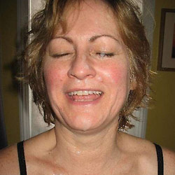 MILF slut gets naked in public