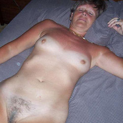 Swinger mom fucked in an orgy
