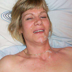 MILF slut gets naked in public