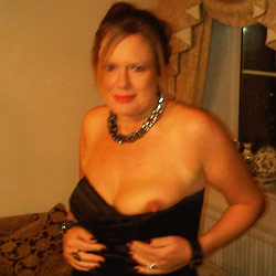 Swinger mom fucked in an orgy