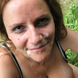 MILF slut gets naked in public