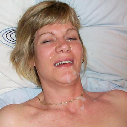 MILF slut gets naked in public