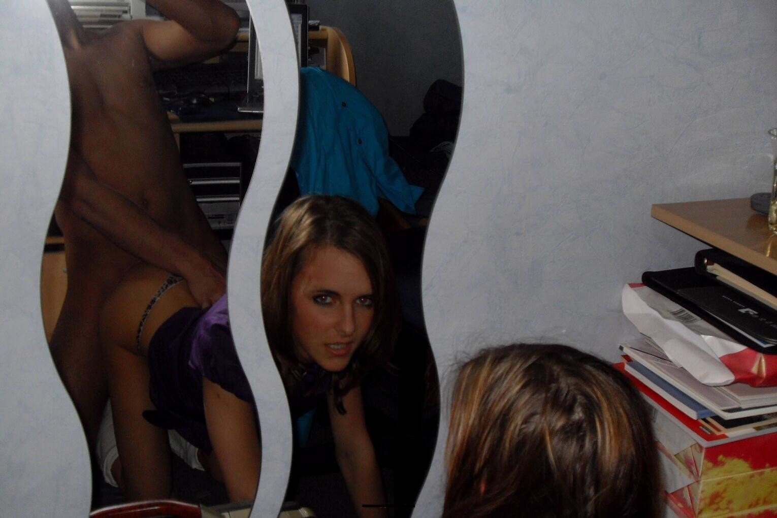 Amateurs having sex in the mirror